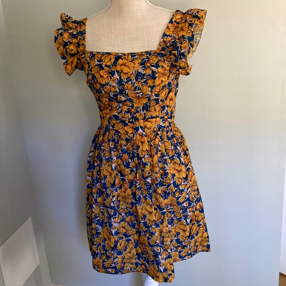 Ruffle sleeve dress with tie back